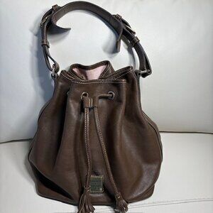 Dooney & Bourke Drawstring Bucket Bag Pebbled Leather Brown Grommets Tassels